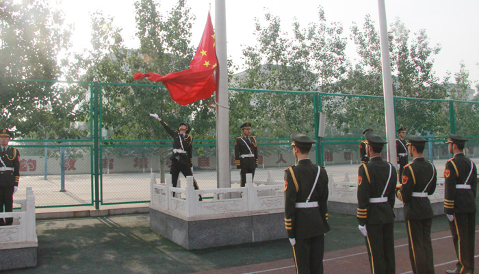 我院国旗护卫队执行孝义市中小学生田径运动会升旗任务