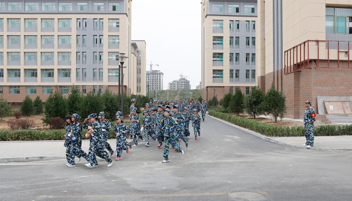 我院举行2014级新生地震消防综合应急疏散演练